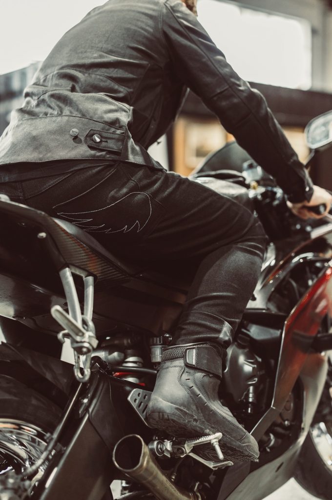 SA1NT riding pants on motorcycle rider